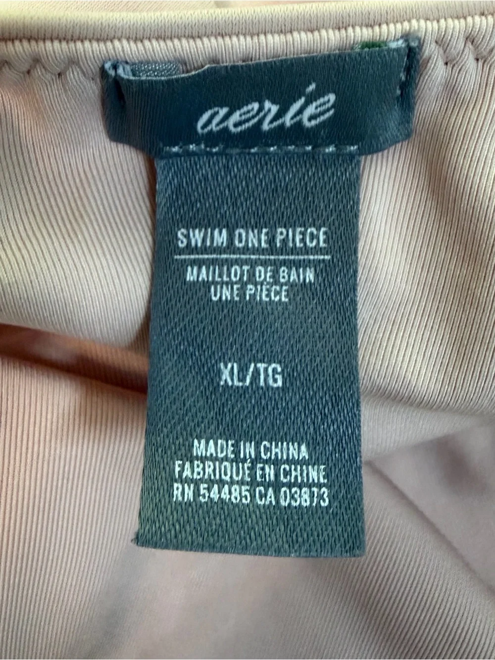 Aerie Plunge Side Ring One Piece Swimsuit in Light Pink. Women’s XL